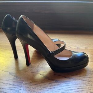 Christian Louboutin black heels. Size 40.5. Fits like a size 10.